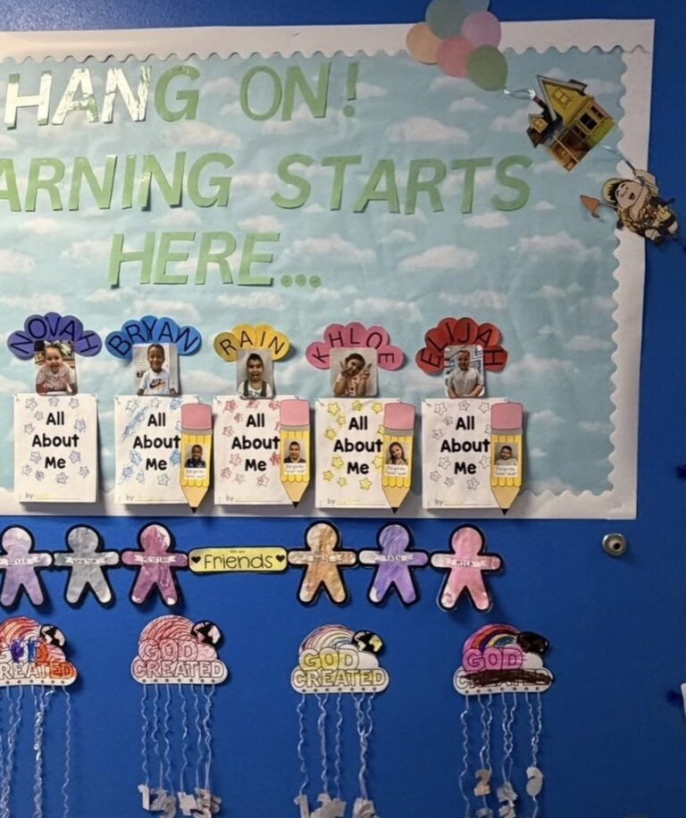 Colorful student artwork displayed in an HFA classroom